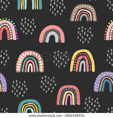Vector seamless pattern with hand drawn cute rainbows and dots. Design for child textile, decoration, wallpaper, stationery.