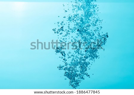 Close up of  air bubble , isolated on blue background.