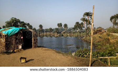 A complete natural picture of the village and Beautiful pictures of sky water and trees. 