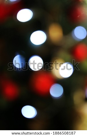 Blurred background of christmas lights and christmas tree