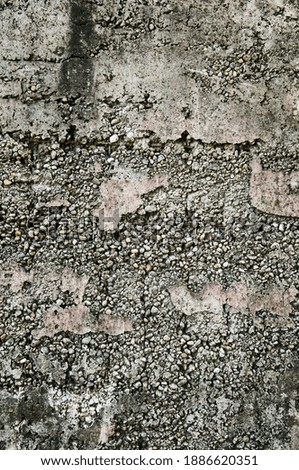 Aged concrete wall texture. Old textured cement grunge wall surface background pattern with cracks and scratches.