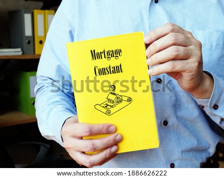 Financial concept meaning Mortgage Constant with sign on the piece of paper.
