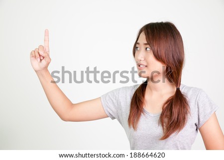 Portrait of  asian woman pointing