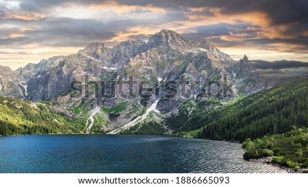 Morskie Oko It is the largest and fourth deepest lake in the Tatra Mountains and falls into the Tatra National Park. Royalty-Free Stock Photo #1886665093