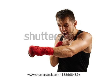 sportsman in red sports bandages on his hands fighting isolated on white background