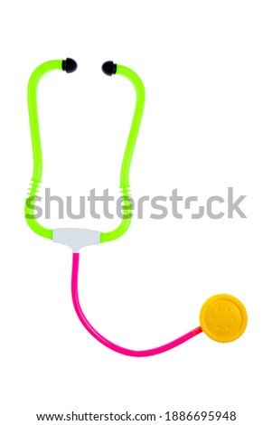 Toy colorful phonendoscope. On a white background, isolated