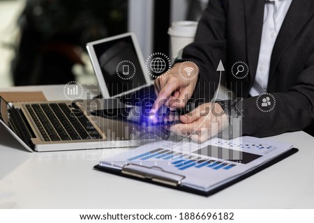 Business hands working with tablet and coding software developer work with AR new design dashboard computer icons, Double exposure, Analysis and fund management concept, blurred background.