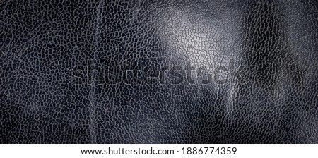 black natural leather with visible details. background