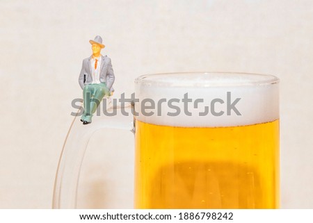 a picture of a beer drinker