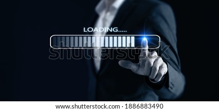 business concept. business man point hand to loading business data. 