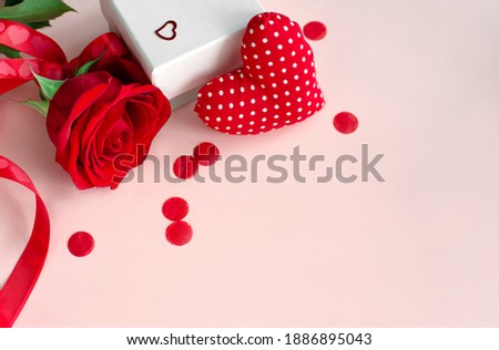 Red shape of heart, gift box and flower of red rose on pink background with copy space, banner, Valentines gift card
