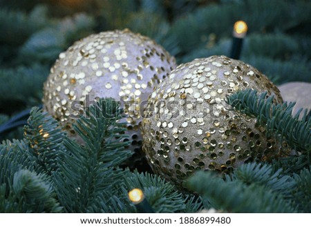 Golden decorative ball with shimmer, lights and shine