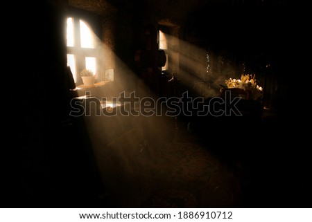 In the morning in Moldova, sunbeams in the cave
