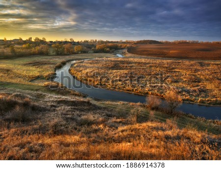 Autumn nature. Landscape of sunrise over river in autumn morning. Nature of Ukraine

