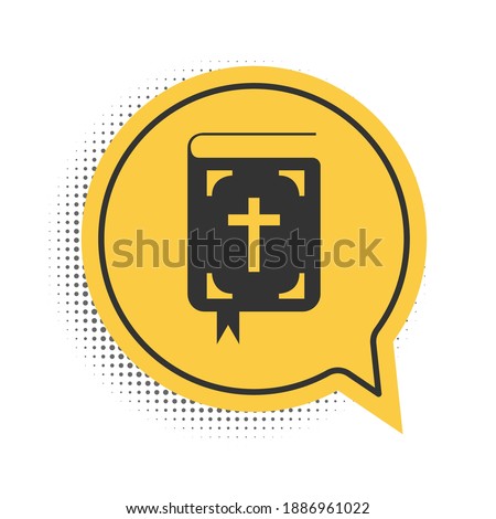 Black Bible book icon isolated on white background. Holy Bible book sign. Yellow speech bubble symbol. Vector.