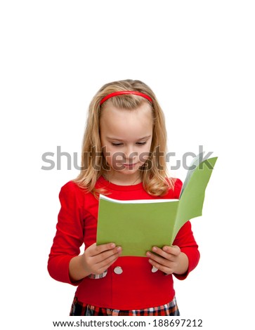 schoolgirl reading a book enthusiastically