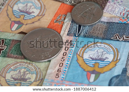 100 fils on Kuwaiti Dinar banknotes background 