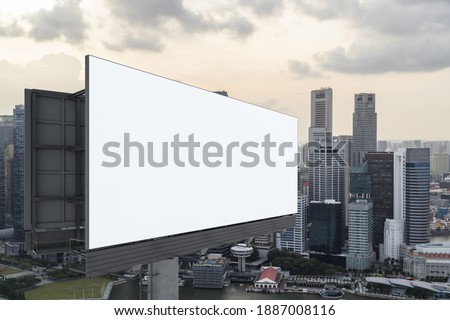 Blank white road billboard with Singapore cityscape background at sunset. Street advertising poster, mock up, 3D rendering. Side view. The concept of marketing communication to sell idea.