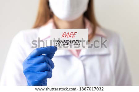 Rare diseases inscription words. Medical concept of unusual disorders. Royalty-Free Stock Photo #1887017032