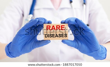 Rare diseases inscription words. Medical concept of unusual disorders. Royalty-Free Stock Photo #1887017050