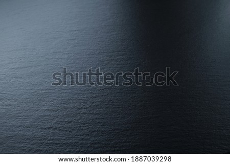 Dark grey black slate texture in natural pattern with high resolution for background and design art work. Stone background slate