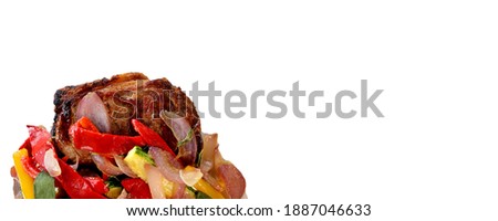 Ancho or Rib Eye. Steak on white background with colorful low carb vegetables