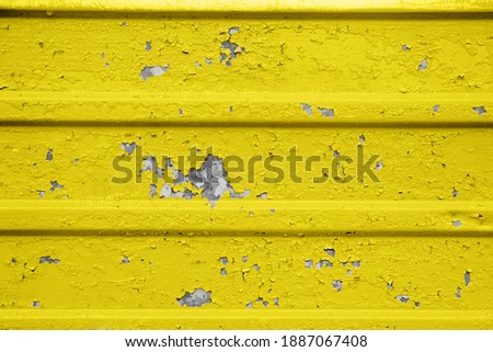 Crackled Paint Background. Old Damaged Cracked Paint Wall, Grunge Background, yellow and gray color