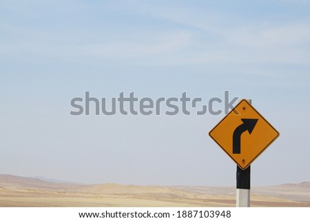 Signal turn left on road, Traffic Sign, Traffic sign on the road in dunas. Peru