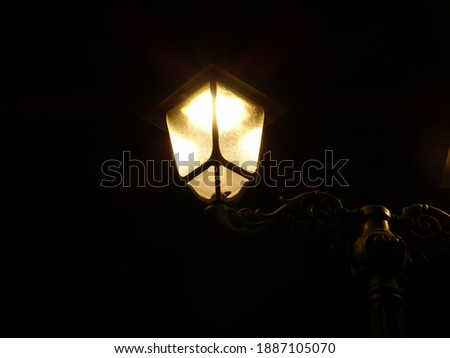 
Beautiful close-up of the old lighthouse, classic warm lamp