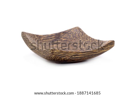 Wooden dish isolated on white background. Coconut wooden plate famous kitchenware from Thailand