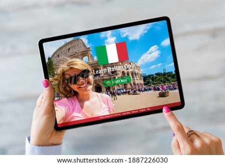 Person taking online courses on tablet to learn Italian language