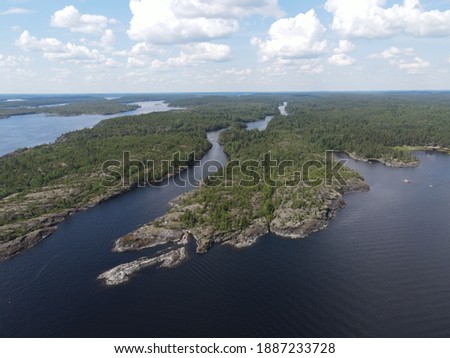 Ladoga nature. Skerries. Water and stones Royalty-Free Stock Photo #1887233728