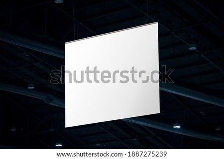 mock up and blank white screen billboard for advertising or information hanging in conference and exhibition hall.