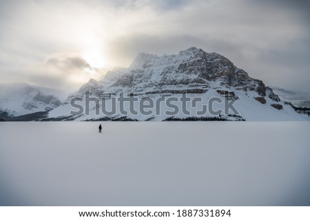 Frozen and snow covered bow lake in winter, banff national park, canada