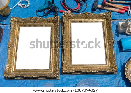 Two Empty Golden Picture Frames at Tarp Flea Market