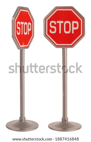 Plastic toy traffic sign stop isolated on white background