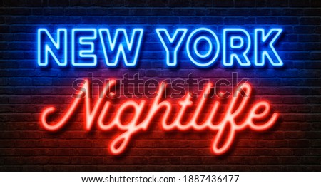 Neon sign on a brick wall - New York Nightlife
