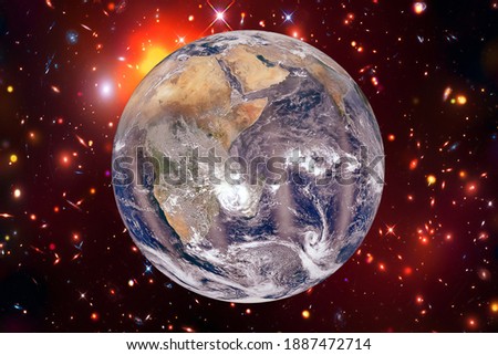 Earth and stars. Blue earth. Great for background.  The elements of this image furnished by NASA.


