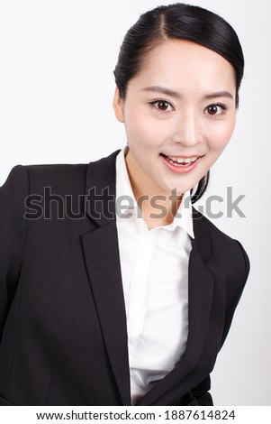 A young business woman in a suit high quality photo 