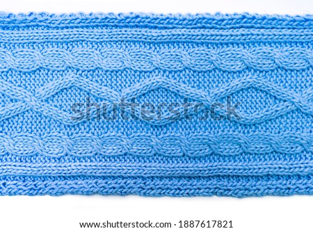 Blue wool scarf with cable pattern