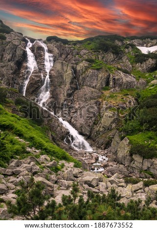 This 65-m. waterfall in the High Tatras mountains is the largest in Poland country. Royalty-Free Stock Photo #1887673552