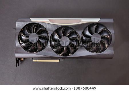 New high end graphics card computer hardware upgrade on a desk Royalty-Free Stock Photo #1887680449