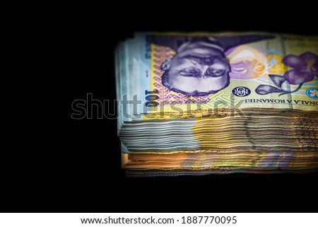Selective focus on stack of LEI romanian money. Lei banknotes isolated. Royalty-Free Stock Photo #1887770095