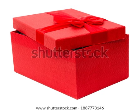 Red gift box with a bow. Isolated on а white background