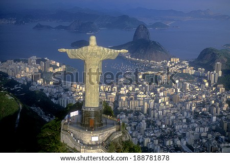 Rio de Janeiro, RJ, Brazil: Aerial view of Christ, symbol of Rio de Janeiro, standing on top of Corcovado Hill, overlooking Guanabara Bay Royalty-Free Stock Photo #188781878