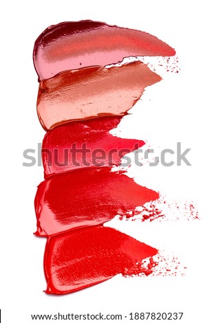Five Colors of Various Lipstick Swatches Isolated on a White Background