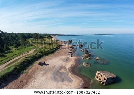Aerial view of the Karosta coast littered with abandoned fortifications of tsarist Russia. Karosta Naval Base is a former Russian imperial and Soviet naval base on the Baltic Sea. Liepaja, Latvia Royalty-Free Stock Photo #1887829432