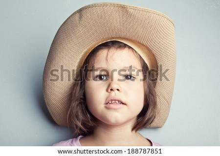 Child in cowboy hat