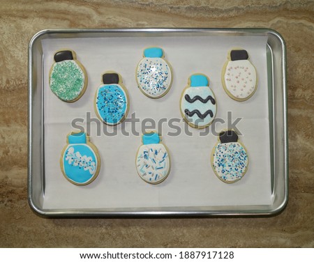 Christmas light shaped sugar cookies decorated with royal icing.