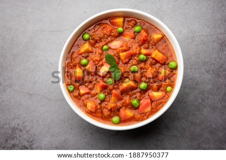 Carrot Curry or Garar Gravy sabzi made using tomato puree and spices, served in a bowl Royalty-Free Stock Photo #1887950377
